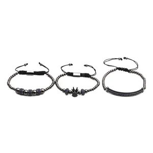 Three-piece gunmetal beaded bracelet set with crown charms and blue zircon accents