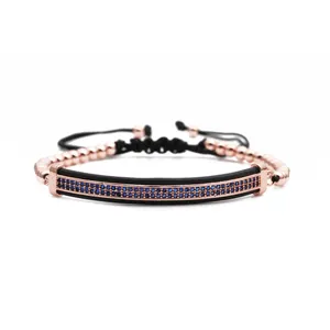 Adjustable beaded bracelet set with rose gold metal beads and blue zircon inlay detail