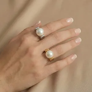 Elegant gold and silver stainless steel rings with large white pearls for women