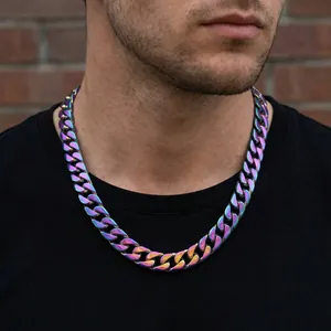 Close-up of a 15mm rainbow iridescent Cuban link chain necklace on a male model