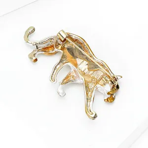 Exquisite golden leopard brooch with white enamel detail and secure pin clasp design