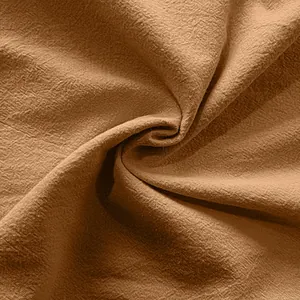 Macro detail of the breathable cotton linen fabric texture on men's casual wide leg pants