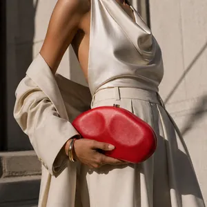 Elegant red irregular shaped evening clutch bag for women in fashion style