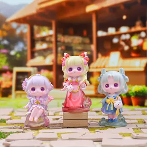 Three cute traditional Chinese style anime figurines in a dreamy street scene