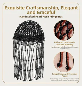 Detail of handcrafted black mesh pearl headpiece with long tassels and intricate weaving