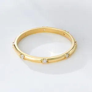Detailed view of gold plated S925 silver ring with sparkling zircon stones