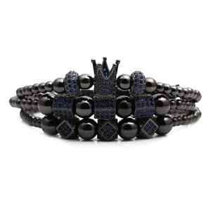Three-piece men's beaded bracelet set featuring black beads and blue zircon crown accents