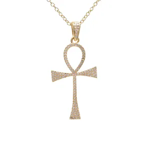 Gouden Ankh-kruis ketting met sprankelende zirkonia hanger aan een fijne schakelketting