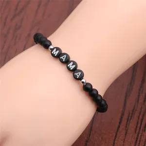 Close-up of MAMA beaded bracelet with matte agate stones and silver accents