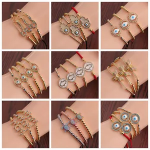 Bracelets à perles dorées ajustables avec œil maléfique en zircon et main de fatma
