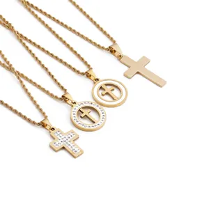 Macro detail of four gold hip hop cross pendants with twisted rope chains in 18K finish