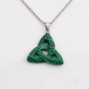 Malachite triquetra celtic knot pendant with silver chain necklace on white background