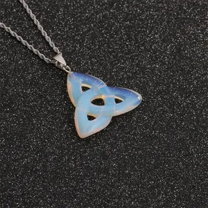 Geometric Celtic Knot pendant with iridescent blue opal glass and silver twist chain