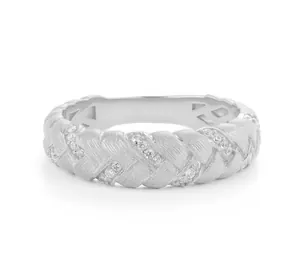 Macro view of silver braided texture ring featuring micro-set sparkling crystals