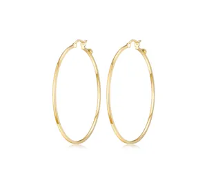 Close-up of polished gold large hoop earrings with latch-back closure on white background