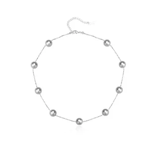 Detail of silver chain necklace featuring ten grey pearls and adjustable lobster clasp