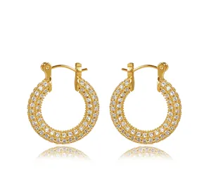 Detail of gold hoop earrings with three rows of pave-set micro zircons and snap closure