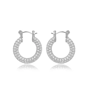 Silver hoop earrings with three rows of shimmering pavé crystals and polished finish