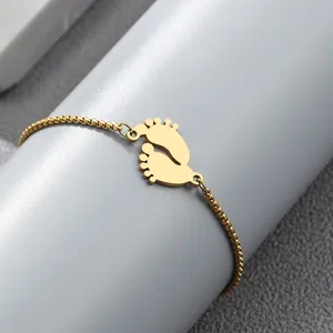 Adjustable gold plated stainless steel bracelet with cute baby footprint charms