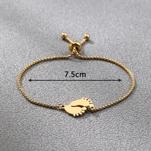 Minimalist gold baby feet pendant bracelet with adjustable box chain and 7.5cm length