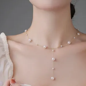 Elegant French vintage pearl necklace with gold chain and stylish Y-shaped tassel pendant