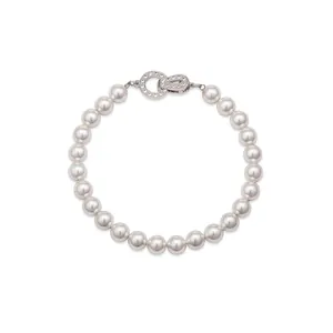 Elegant French vintage white round pearl bracelet with a sparkling diamond-encrusted silver clasp