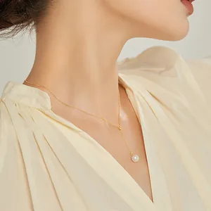 Elegant gold Y-shaped necklace with a single round white pearl pendant for women