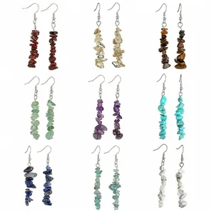 Set of nine pairs of natural stone tassel earrings including amethyst and tiger eye crystals