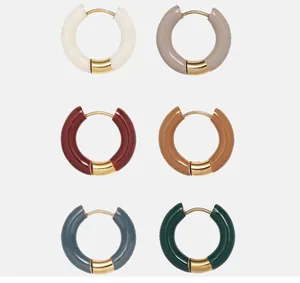 Detail of French vintage enamel hoop earrings in six assorted colors with gold accents
