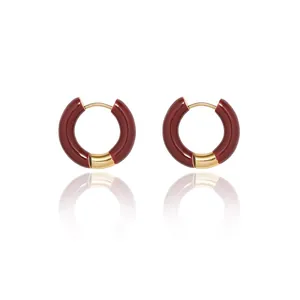 French vintage gold hoop earrings with red-brown enamel glaze on white background