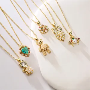 Charming animal pendants collection featuring gold necklaces with pearls and zircons