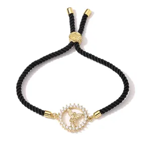 Adjustable Tree of Life bracelet with gold angel pendant and zircon inlay on black rope
