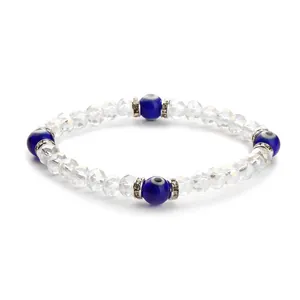 Blue Evil Eye beaded bracelet featuring faceted crystal beads and silver spacers
