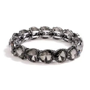 Elegant beaded heart bracelet with smoky grey crystals and dark metal finish