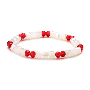 Sparkling crystal beaded bracelet with red round faceted and white cube beads in a minimalist loop