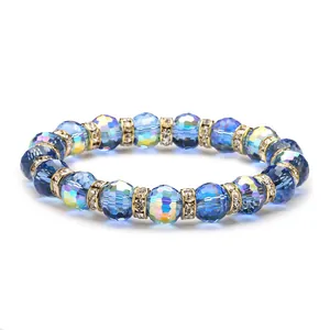 Sparkling 10mm blue faceted crystal bead bracelet with gold rhinestone spacers