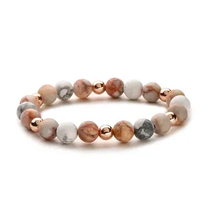 Naturstein-Armband mit Marmormuster und roségoldenen Metall-Zwischenperlen