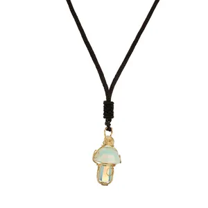 Handmade wire-wrapped natural opal mushroom pendant necklace with black cord strap