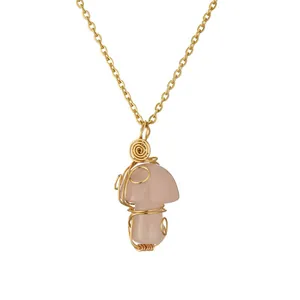 Handmade wire wrapped pink crystal mushroom pendant necklace with a gold chain