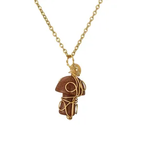 Handmade gold wire wrapped goldstone mushroom pendant necklace on a delicate gold chain