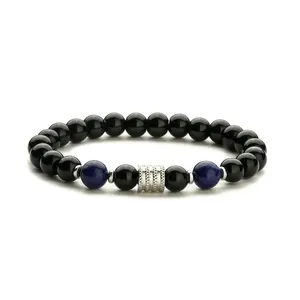 Pulsera de hombre con ónix negro, lapislázuli azul y cilindro de metal plateado texturizado