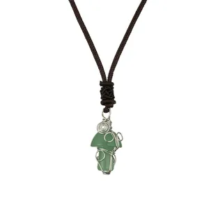 Handmade silver wire-wrapped green crystal mushroom pendant necklace with woven cord