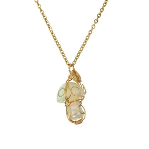 Handmade mushroom pendant necklace with white opal stone and gold wire wrapping