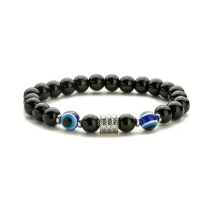 Pulsera de hombre con cuentas de ónix negro, ojo turco azul y amuleto de plata tallada