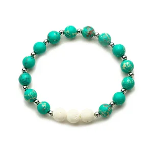 Elastic beaded bracelet featuring turquoise style stones with white volcanic lava accents