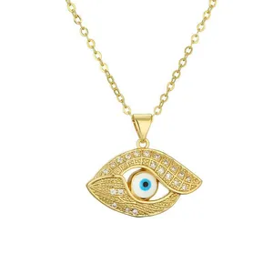 Gold Evil Eye pendant necklace with blue enamel pupil and pave white zircon settings