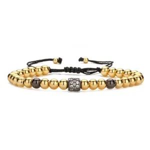 Handmade woven bracelet with gold copper beads and colorful zircon micro-pave charms
