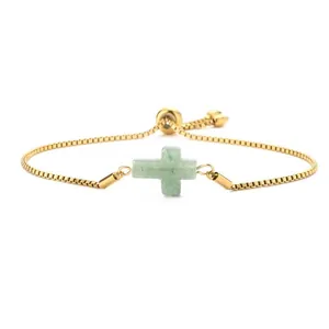 Minimalist gold box chain bracelet featuring a natural green stone cross pendant and adjustable closure