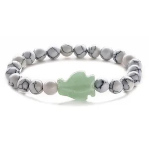 Natural white turquoise beaded bracelet with a green aventurine arrow accent charm
