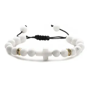 White natural stone beaded bracelet featuring a cross charm and gold rhinestone accents